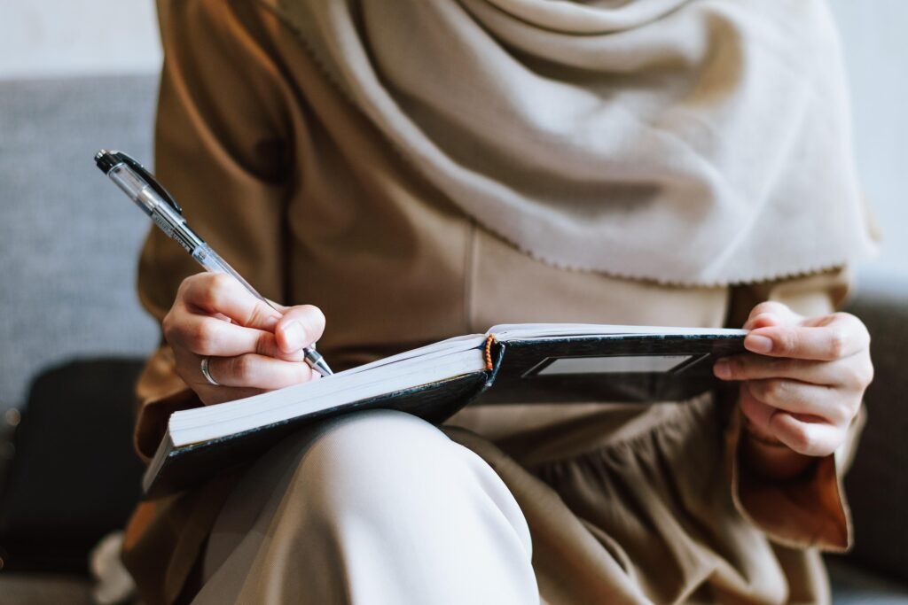Pen in Hand Gliding over Paper